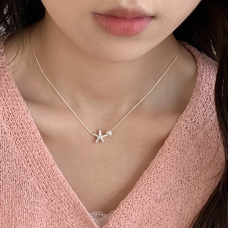 Damen Anhänger mit Sternenmotiv und Perle Shop Nory