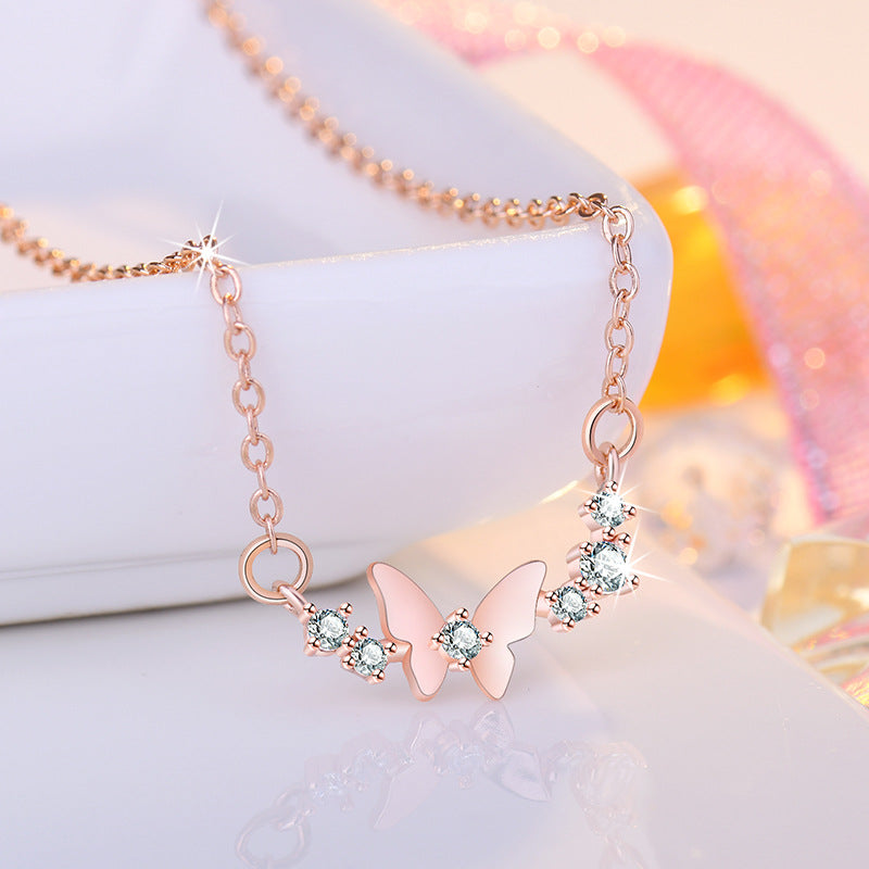 Damen Halskette mit filigranem Schmetterlingsdesign und funkelnden Zirkonia Shop Nory