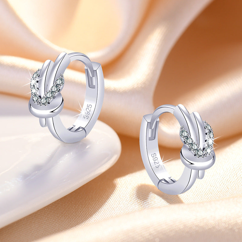 Damen Ohrringe mit elegantem Knoten-Design und funkelndem Zirkonia-Besatz Shop Nory