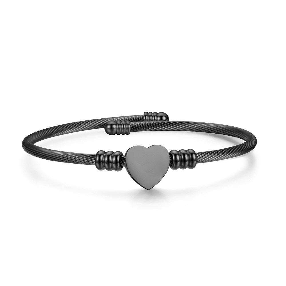 Damen Armreif mit stilvollem Herzanhänger aus hochwertigem Edelstahl Shop Nory