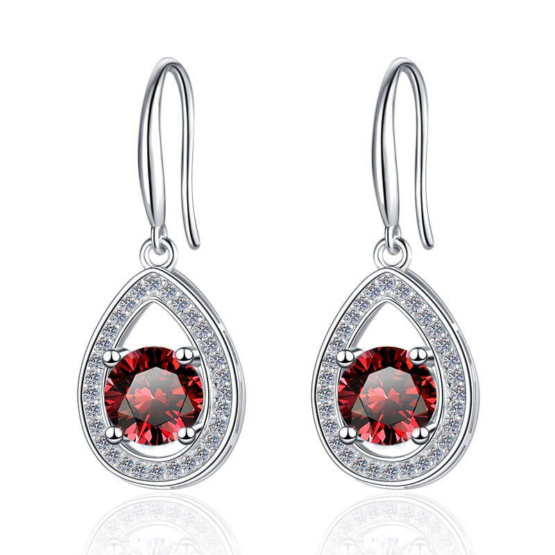Damen Ohrhänger mit glänzendem Zirkonia und eleganter Tropfenform Shop Nory