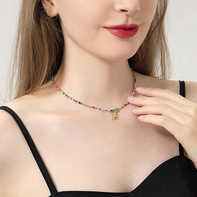 Damen Halskette mit bunten Perlen und individuell gestaltetem Anhänger Shop Nory