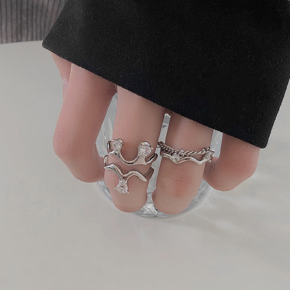 Damen Offener Ring mit elegantem Wellenmotiv und funkelnden Zirkonia Shop Nory