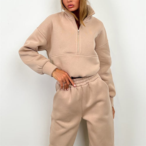 Damen Cropped-Halbzip-Sweatshirt mit hohem Stehkragen und elastischer High-Waist Jogginghose Set Shop Nory