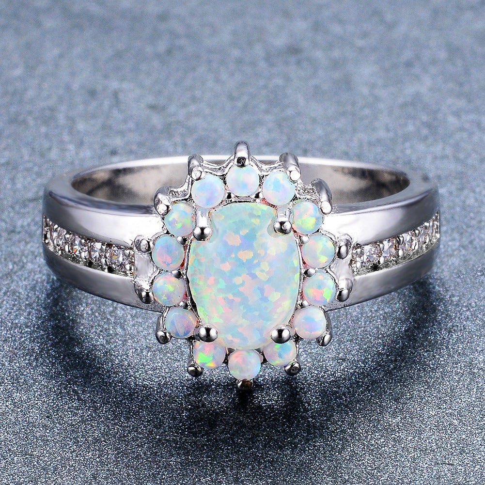 Damen Ring mit funkelndem Opal und floraler Zirkonia-Verzierung Shop Nory