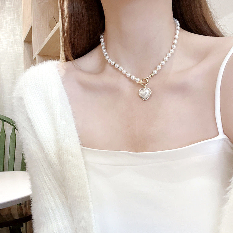 Damen mehrlagige Halskette mit zarten Perlen und tropfenförmigem Anhänger Shop Nory