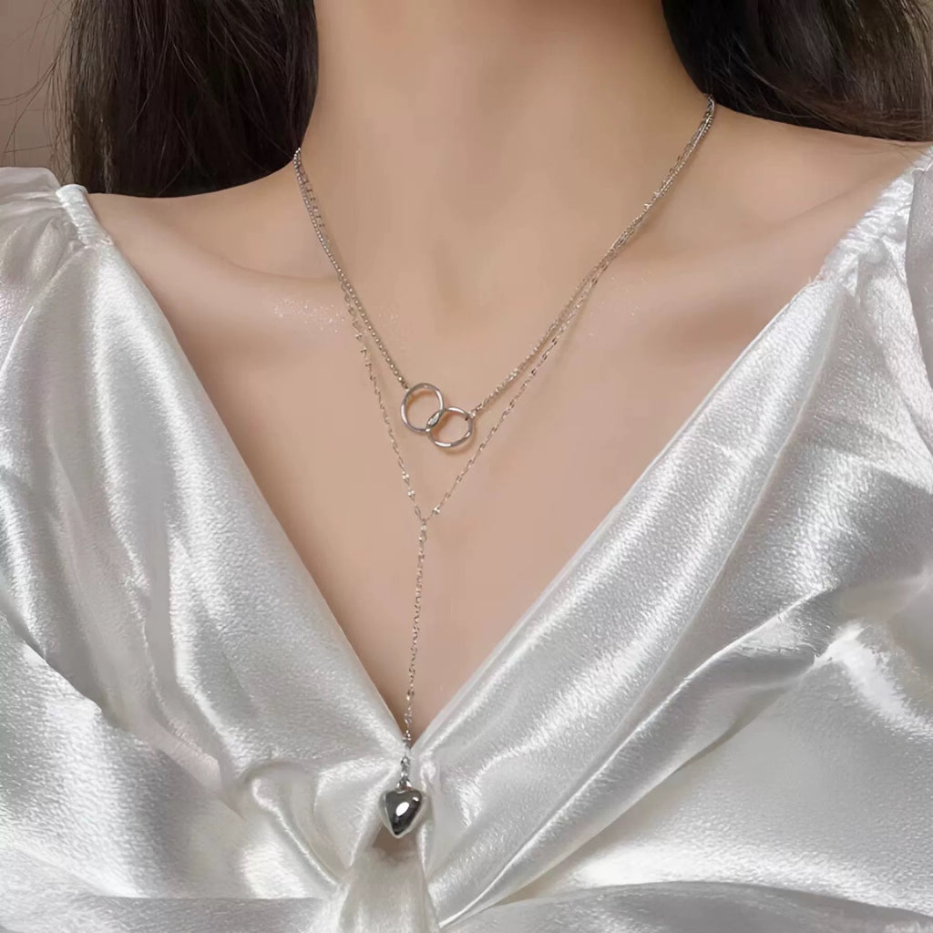 Damen Halskette mit eleganten Ringanhängern und herzförmigem Charm Shop Nory