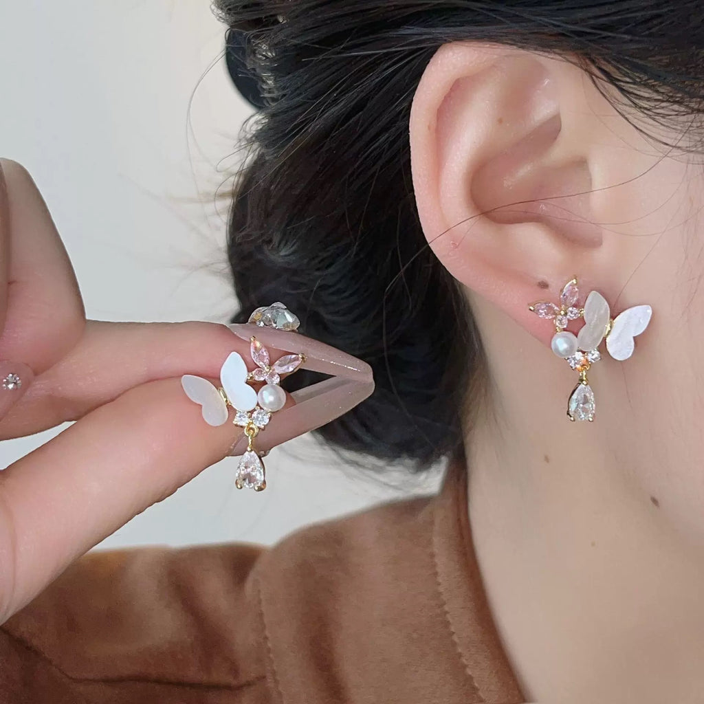 Damen Ohrstecker mit elegantem Schmetterlingsdesign und funkelnden Zirkonia Shop Nory