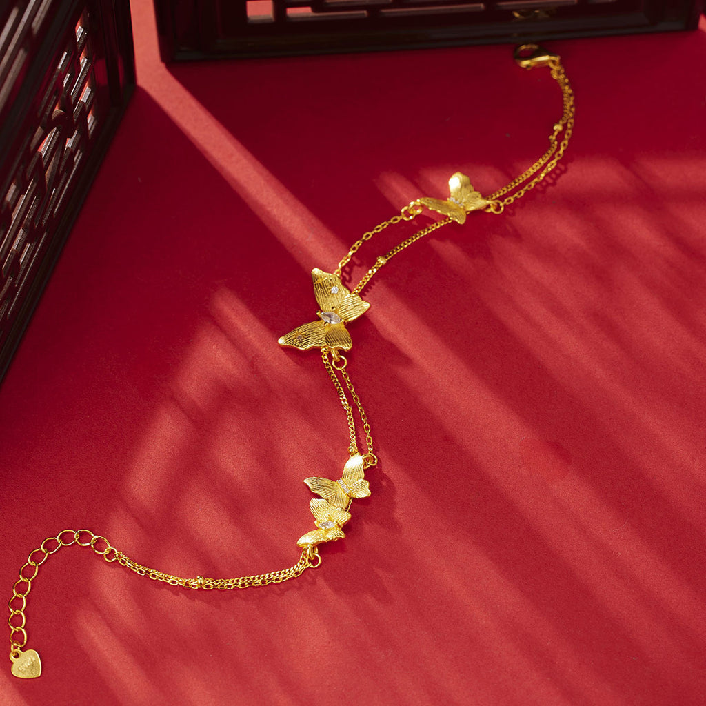 Damen Armband mit kunstvollen Schmetterlingsanhängern Shop Nory