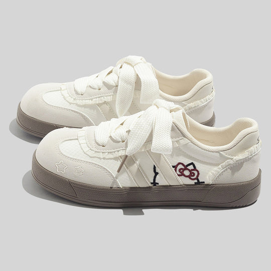 Damen Sportliche Sneaker mit verspieltem Design und einzigartigen Applikationen