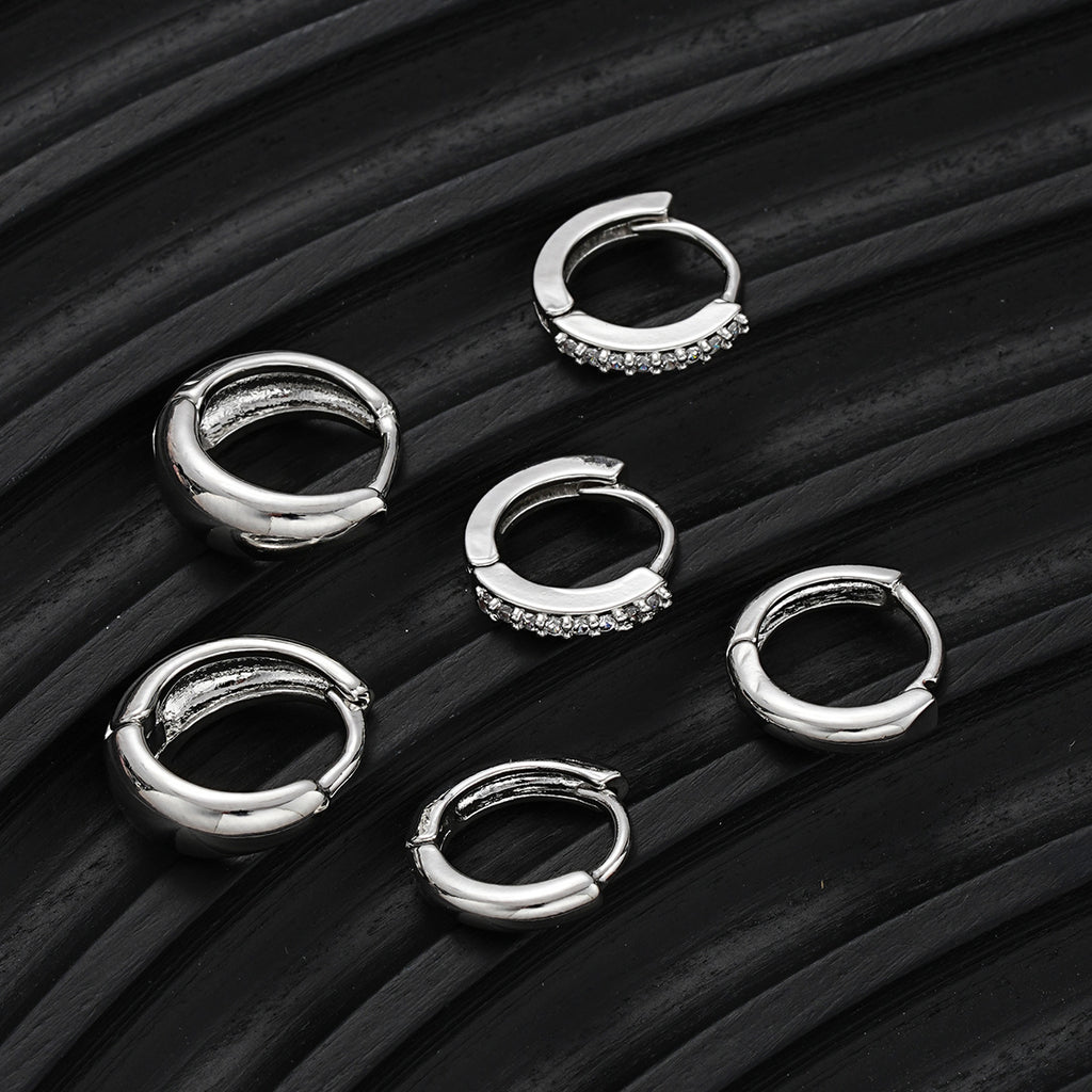 Damen Ohrringe mit funkelnden Zirkonia und geschwungenem Design Shop Nory