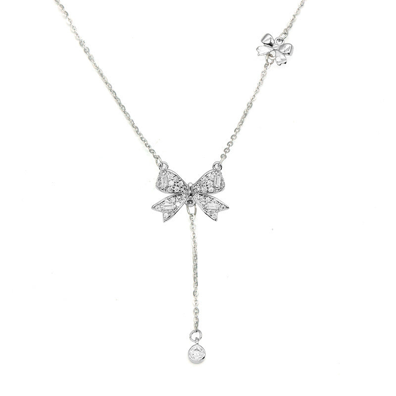 Damen Halskette mit filigranem Schmetterlingsdesign und funkelnden Zirkonia Shop Nory