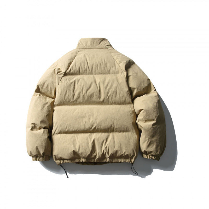 Unisex Boxy wattierte Stehkragen‑Pufferjacke mit Tunnelzugsaum und Pattentaschen Shop Nory