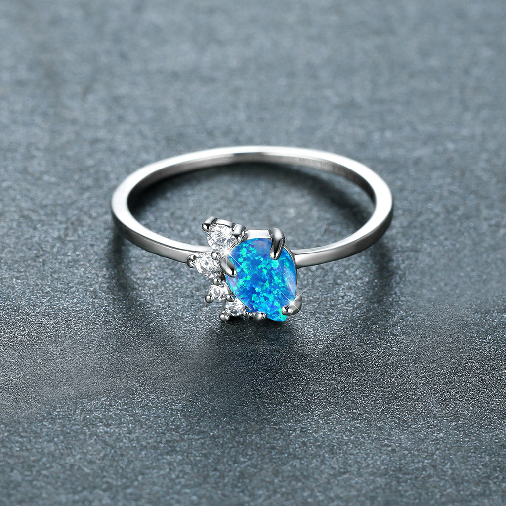 Damen Schmuckring mit funkelndem Opal und kristallinem Design Shop Nory