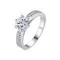 Damen Verlobungsring mit funkelndem runden Zirkonia und eleganter Fassung Shop Nory