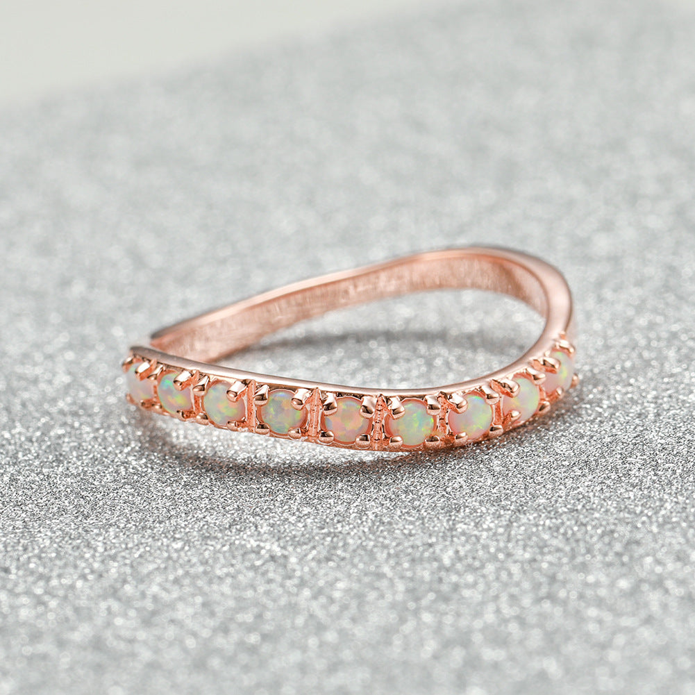Damen Ring mit funkelnden opalisierenden Steinen Shop Nory