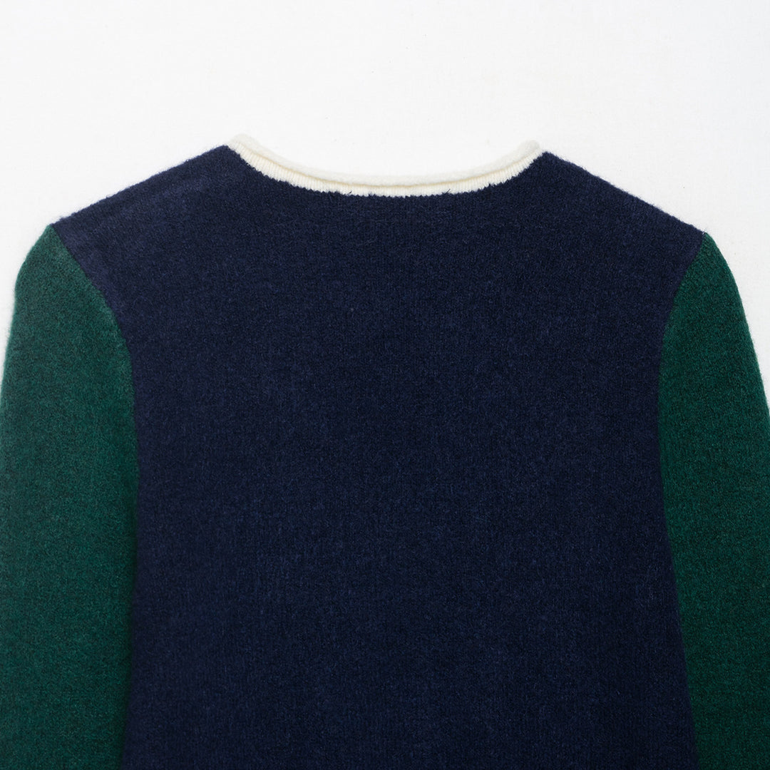 Damen Kuscheliger Colorblock-Pullover mit Rundhalsausschnitt und Kontrastärmeln Shop Nory
