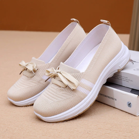 Damen Schlupf-Strick-Sneaker mit dekorativer Schleife und gedämpfter Plateausohle Shop Nory