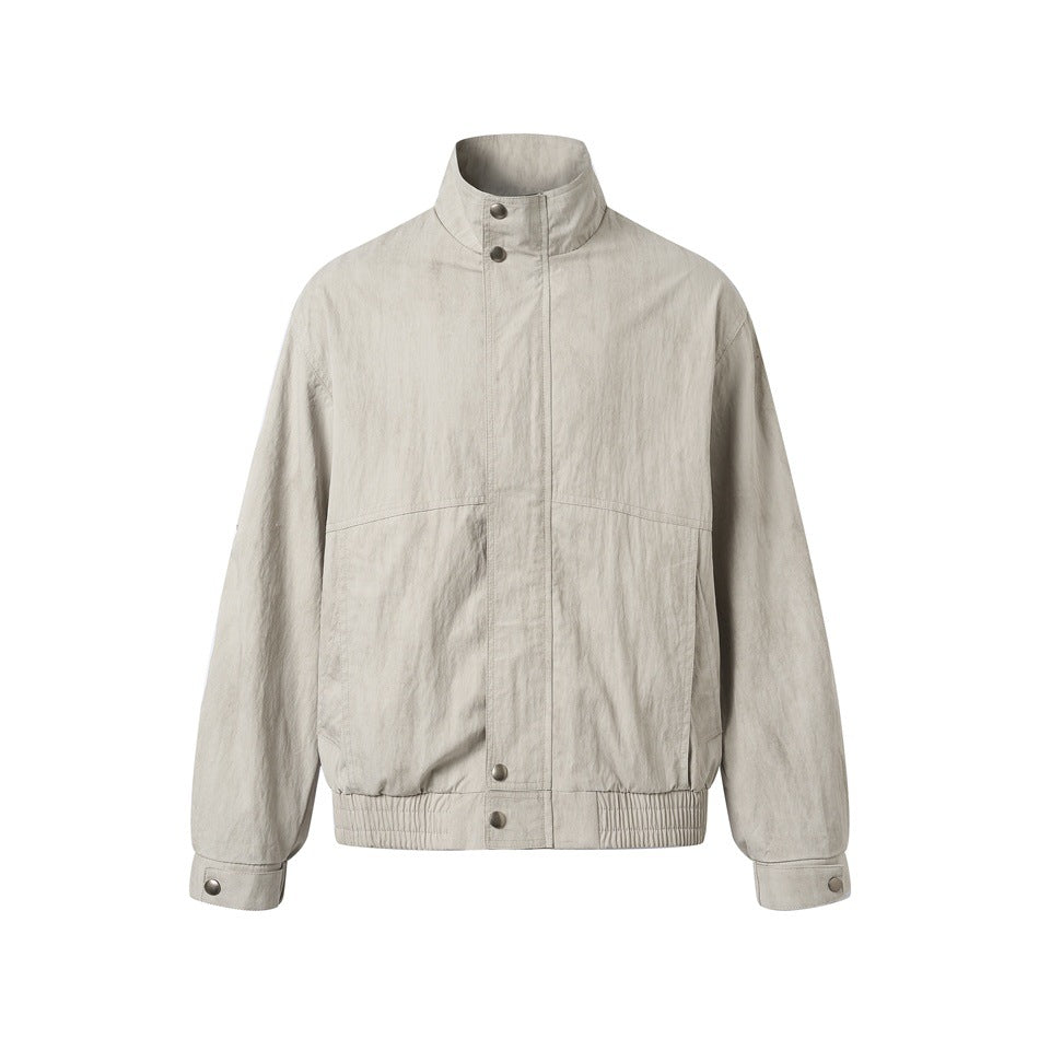 Unisex Kurzblouson im minimalistischen Workwear‑Look mit hohem Stehkragen und Druckknopfverschluss Shop Nory