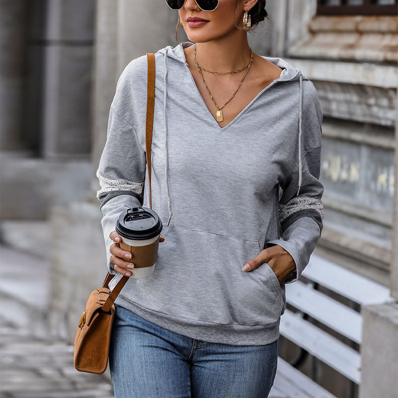 Damen Kapuzenpullover mit V‑Ausschnitt, Kängurutasche und kontrastierenden Ärmeln Shop Nory