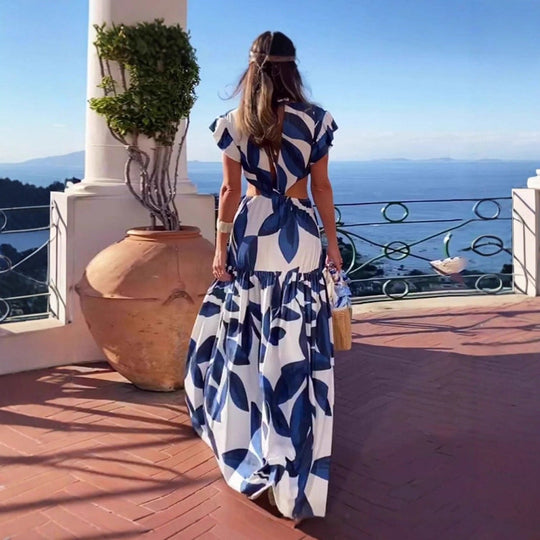 Damen Maxi-Kleid mit raffinierten Cut-Out-Details und voluminösen Rüschen Shopnory