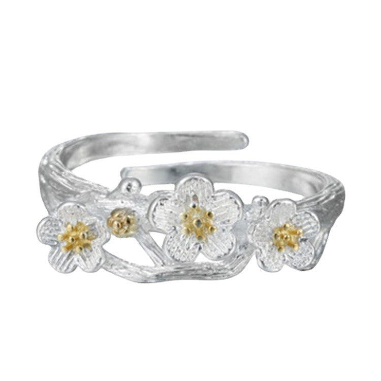 Damenring mit floralem Design und feinen Goldakzenten Shop Nory