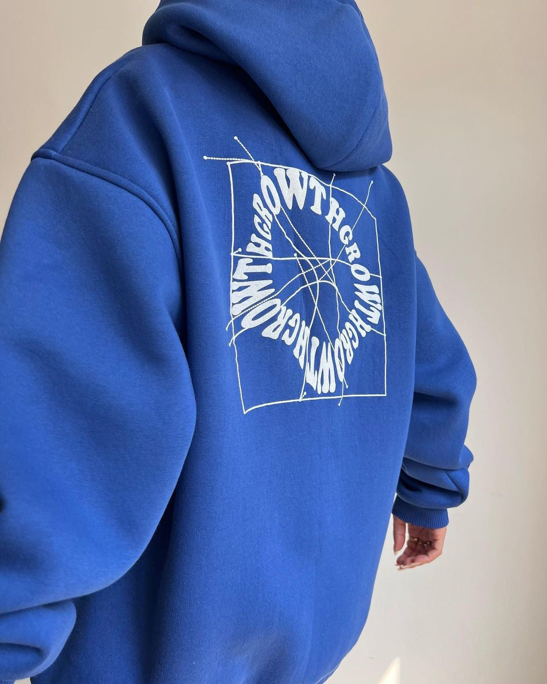 Damen Oversized Kapuzenpullover mit abstraktem Rückenprint und gerippten Bündchen Shop Nory