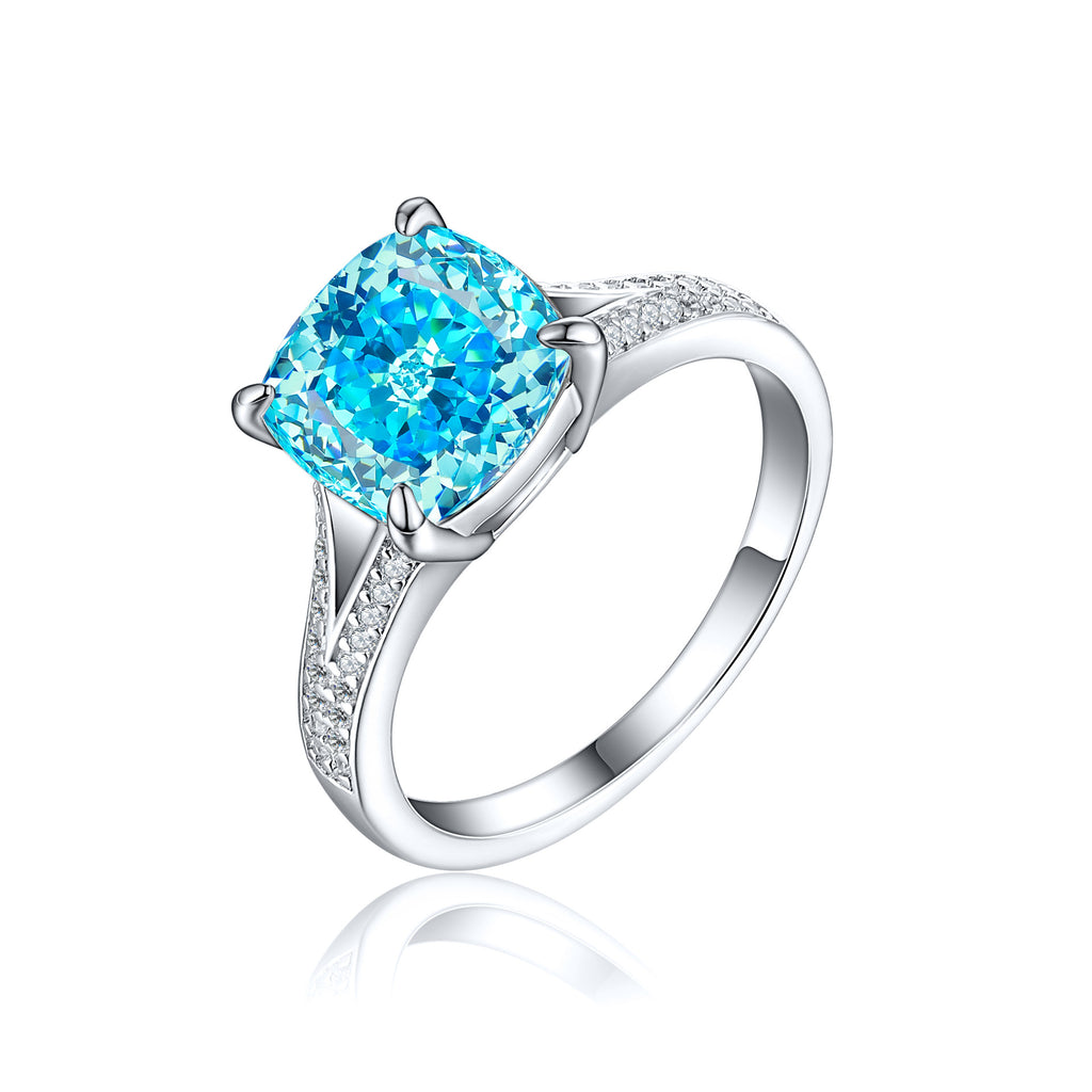 Damen Ring mit funkelndem Aquamarin und kunstvollen Zirkonia-Besatz Shop Nory