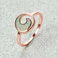 Damen Ring mit eleganter Spiralform und schimmerndem Opal Shop Nory