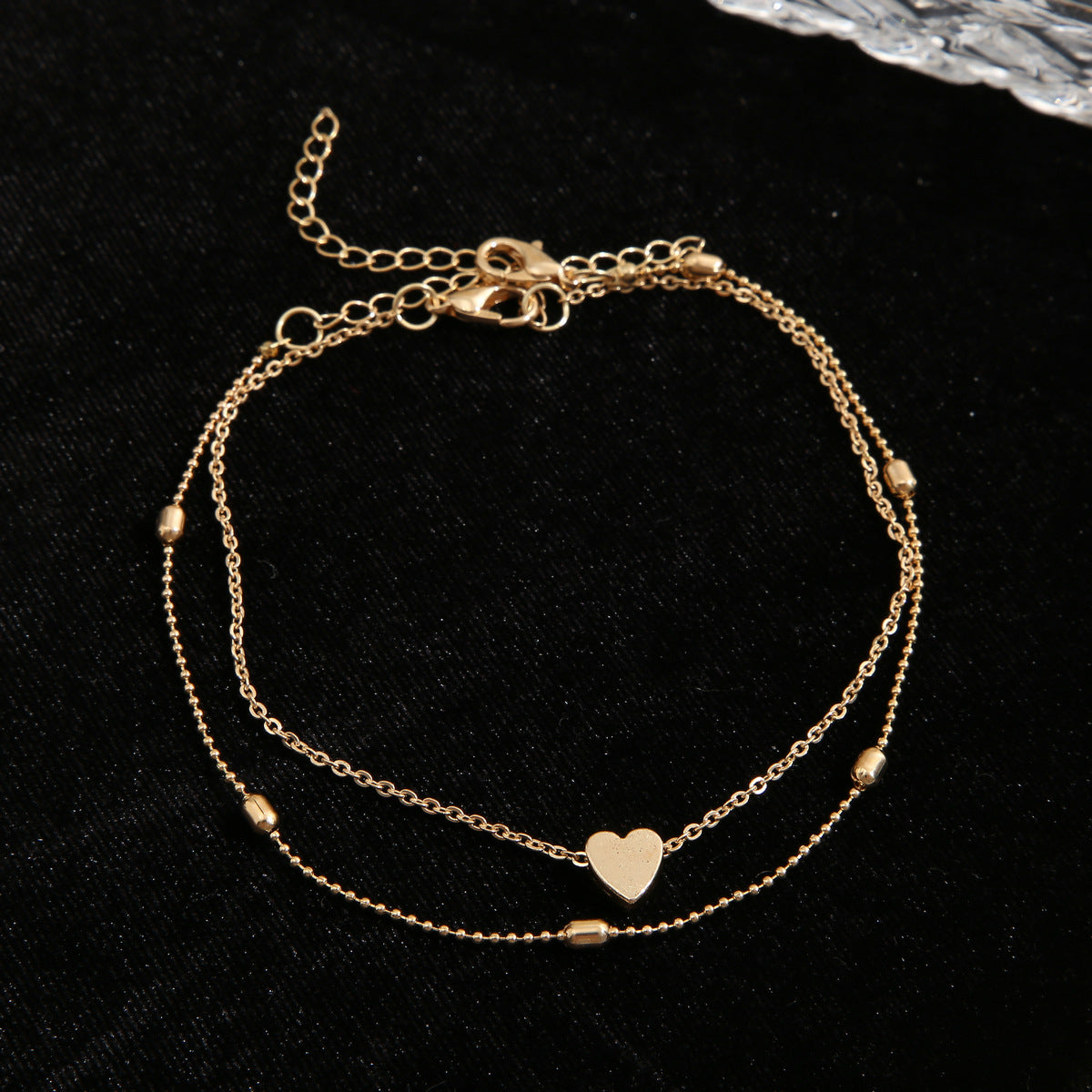 Damenarmband mit zierlichen Herz- und Perlenakzenten Shop Nory