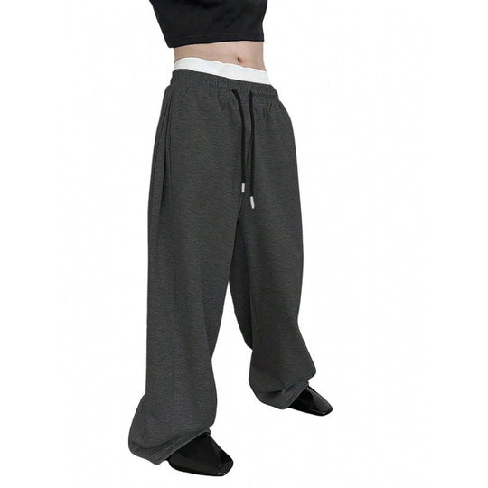 Damen weite Oversize Jogginghose mit tiefem Schritt, elastischem Bund und Kordelzug Shop Nory