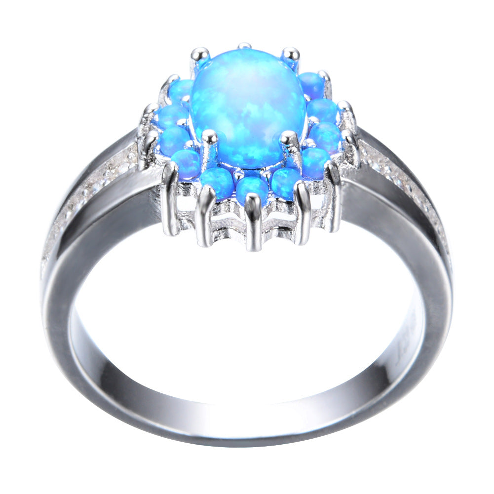 Damen Ring mit funkelndem Opal und floraler Zirkonia-Verzierung Shop Nory