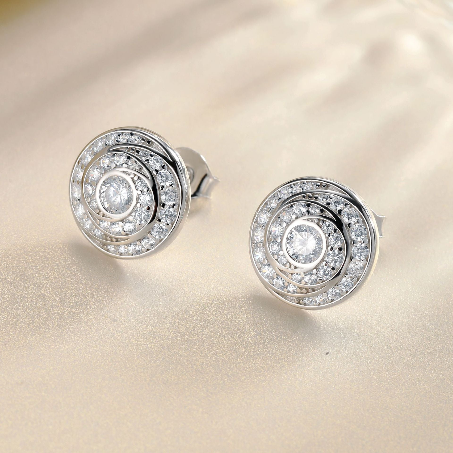 Damen-Ohrstecker mit spiralförmigem Zirkonia-Besatz Shop Nory