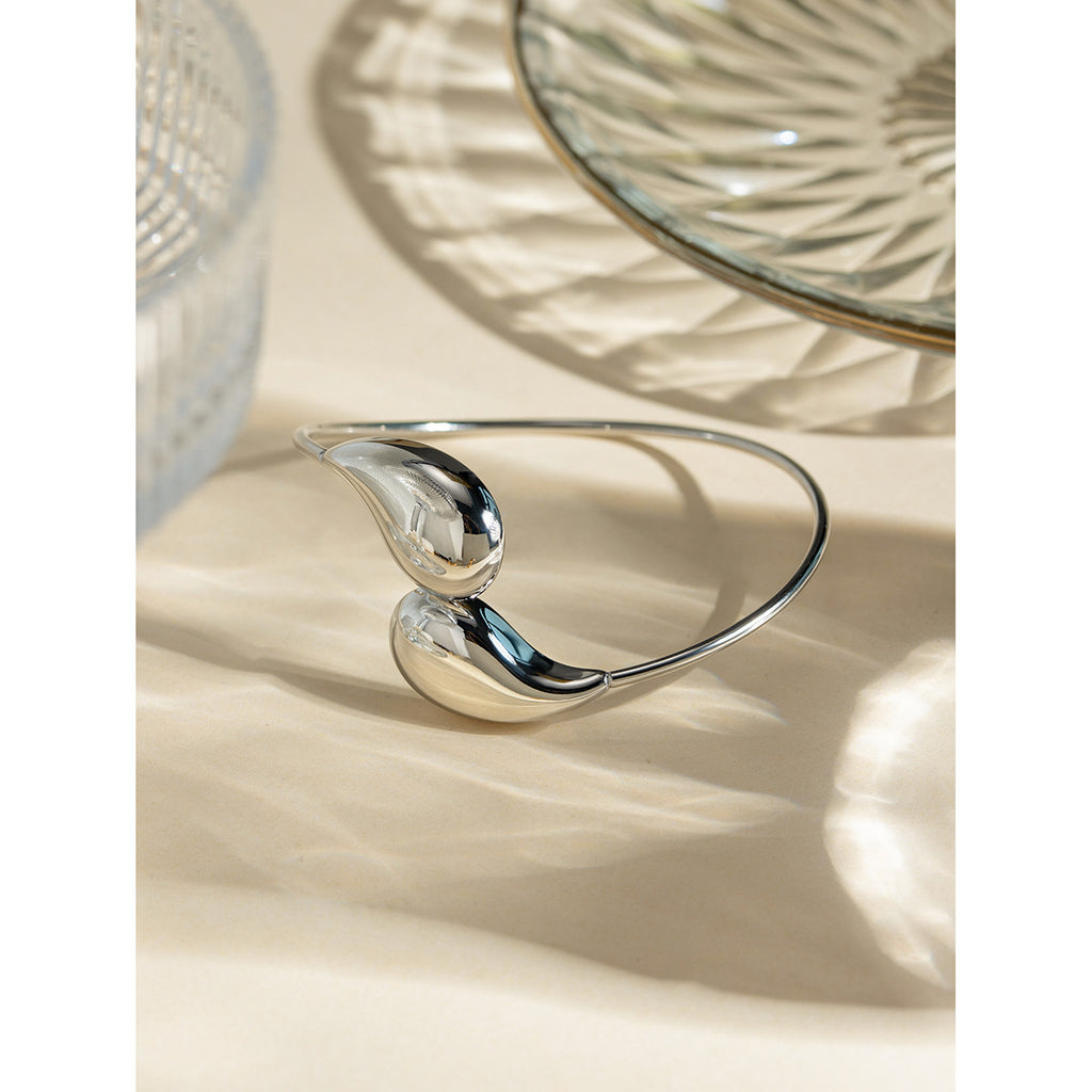 Damen Offenes Armband mit eleganten geschwungenen Designs aus hypoallergenem Edelstahl Shop Nory