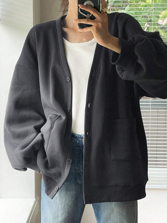 Damen Oversized Sweatcardigan mit Knopfleiste, aufgesetzten Taschen und überschnittener Schulter Shop Nory