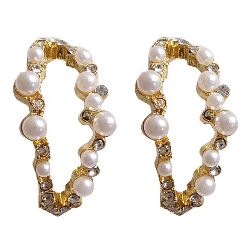 Damen Ohrringe mit handgefertigtem Ziermuster und funkelnden Details Shop Nory