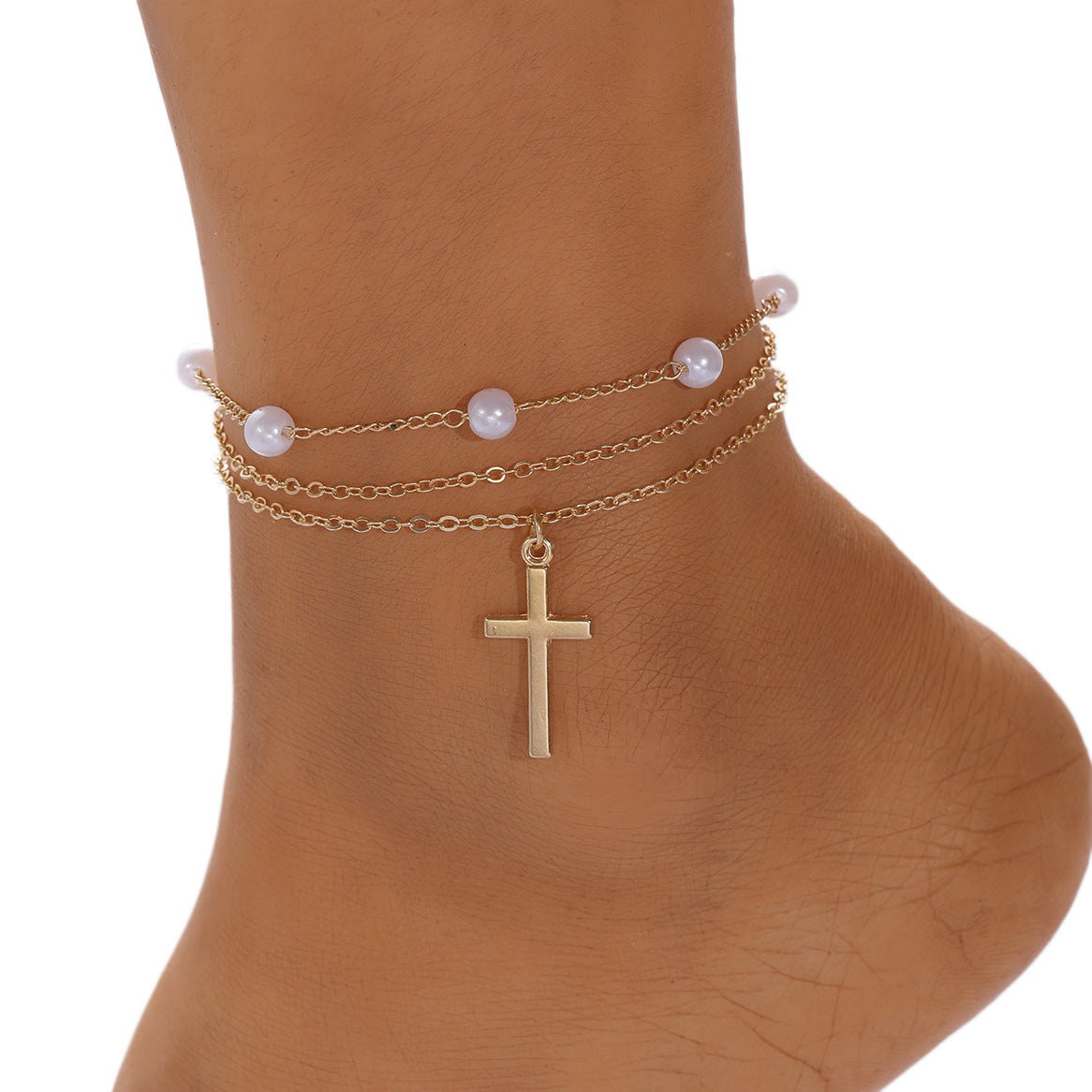 Damen Fußkettchen mit elegantem Perlendesign und subtilen Kreuzanhänger Shop Nory