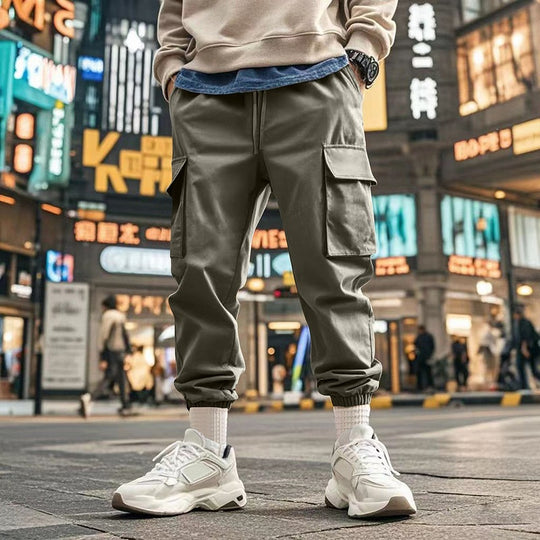 Herren Tapered Cargo-Jogginghose mit Kordelzug, aufgesetzten Klappentaschen und elastischen Bündchen Shop Nory