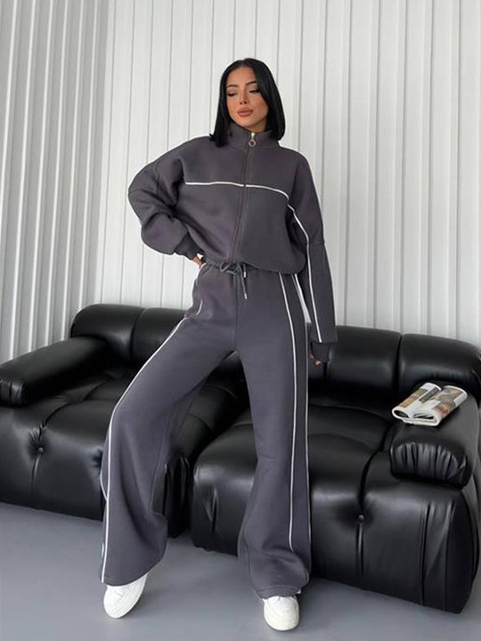 Damen lässiges Sweatset mit Stehkragen Reißverschluss gekürzter Jacke und hochtaillierter Schlaghose Shop Nory