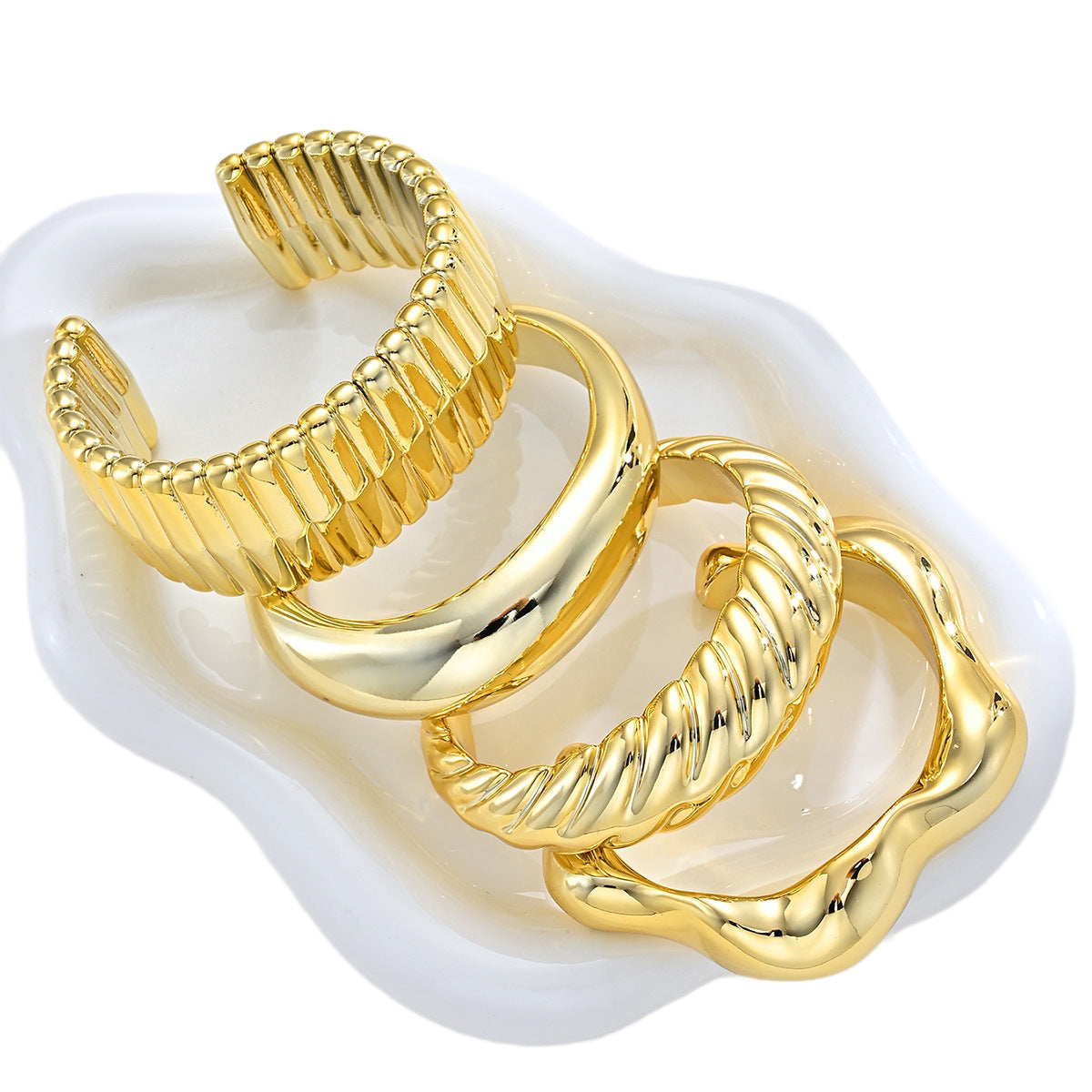 Damen Armreifen-Set aus hochwertigem Metall mit einzigartigen Oberflächenstruktur Shop Nory