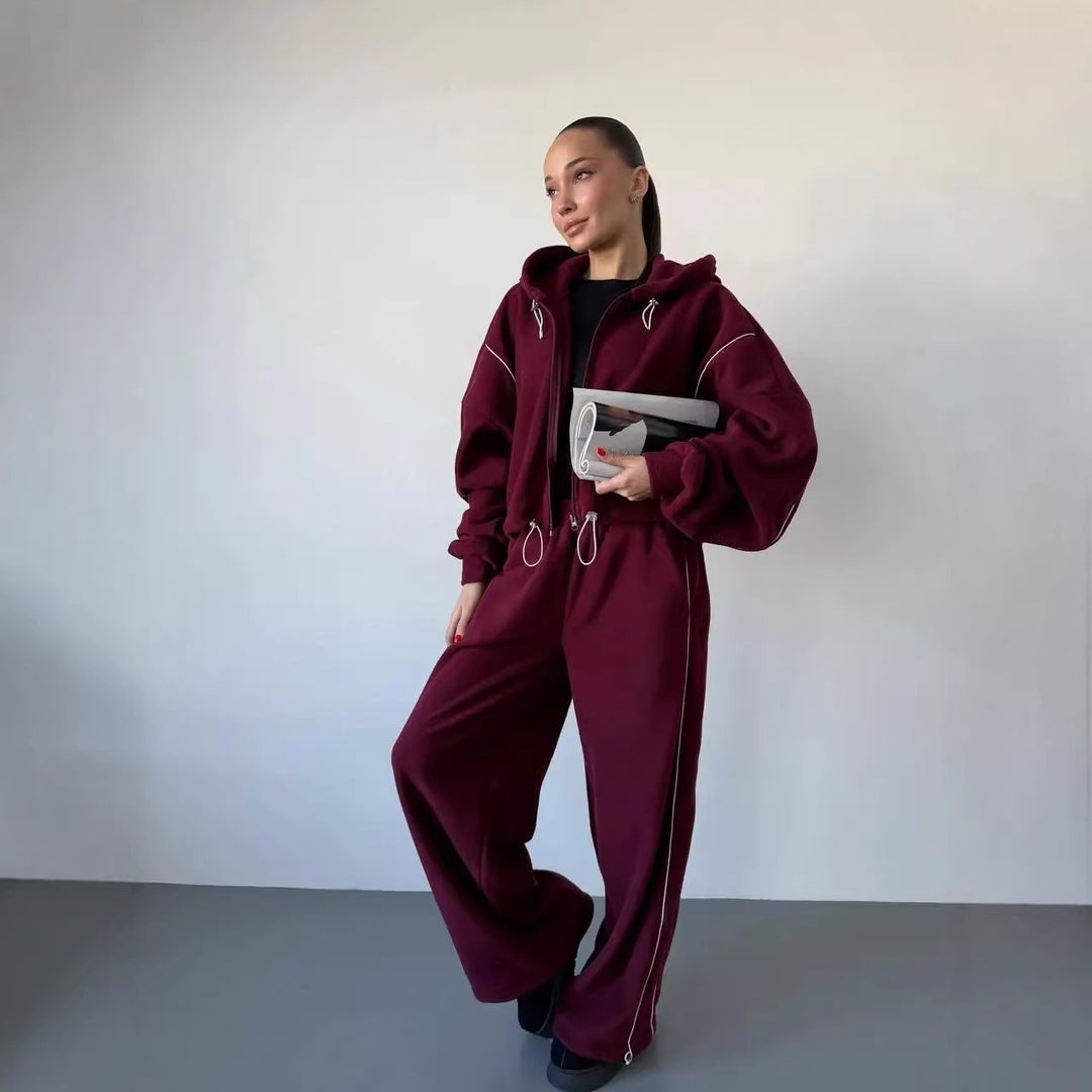 Damen gekürztes Zip-Hoodie mit Tunnelzug und hochgeschnittener weiter Fleece-Loungehose Shop Nory