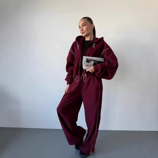 Damen gekürztes Zip-Hoodie mit Tunnelzug und hochgeschnittener weiter Fleece-Loungehose Shop Nory
