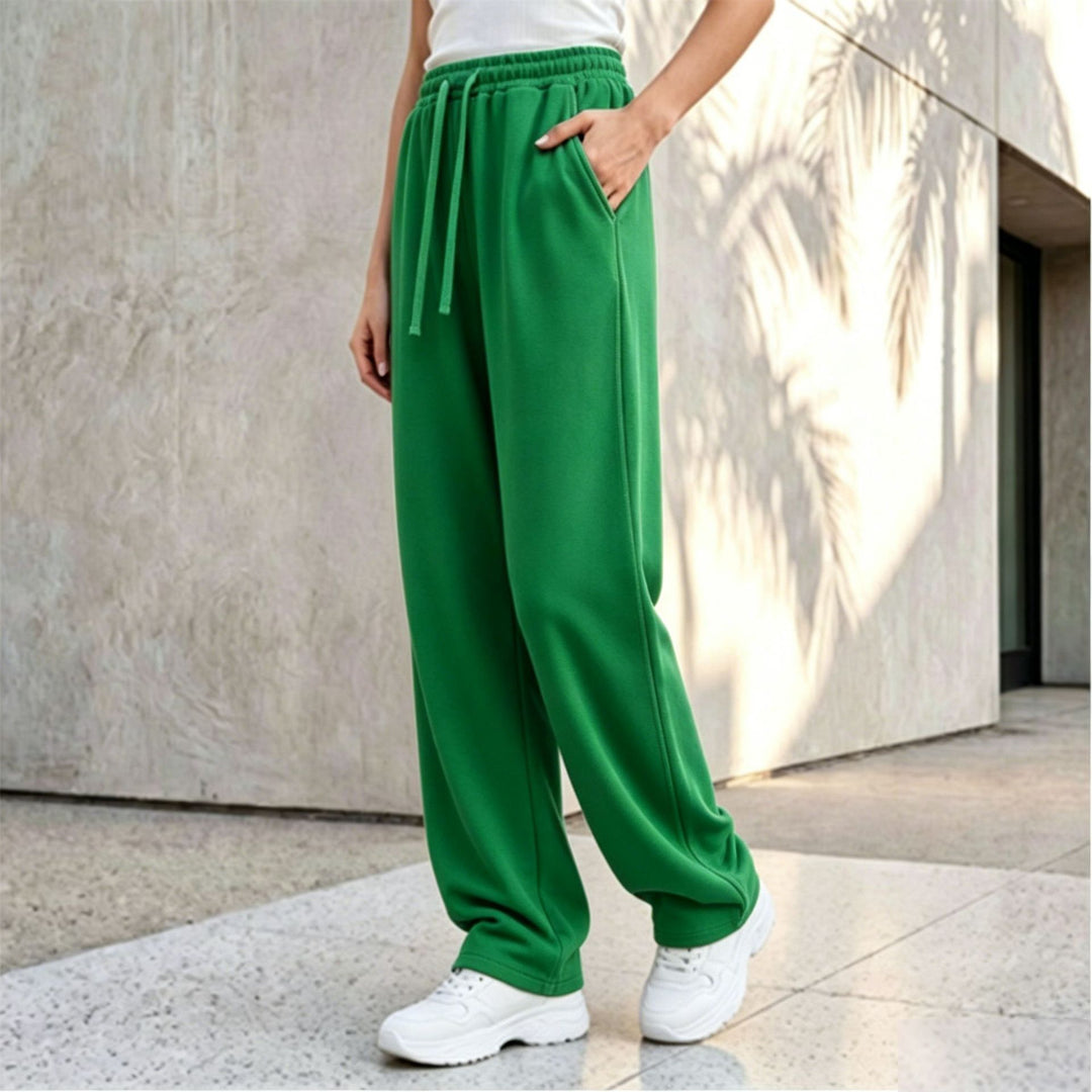 Damen nan weite Loungepalazzo-Hose mit hohem Komfortbund, Kordelzug, seitlichen Eingrifftaschen und dekorativer Seitennaht Shop Nory