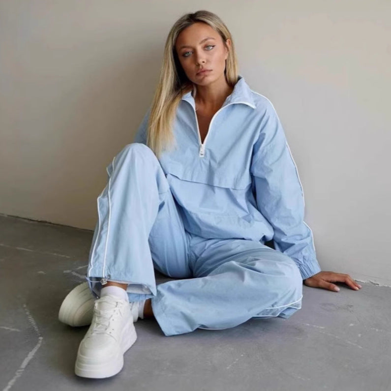 Damen leichtes Half-Zip Windbreaker-Oberteil mit Kängurutasche, elastischen Bündchen und seitlicher Paspel Shop Nory