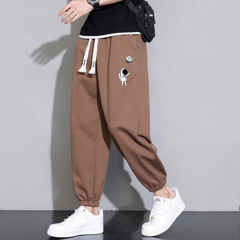 Herren Lockere Jogginghose mit Astronauten-Print, Kordelzugbund und elastischen Saumbündchen Shop Nory