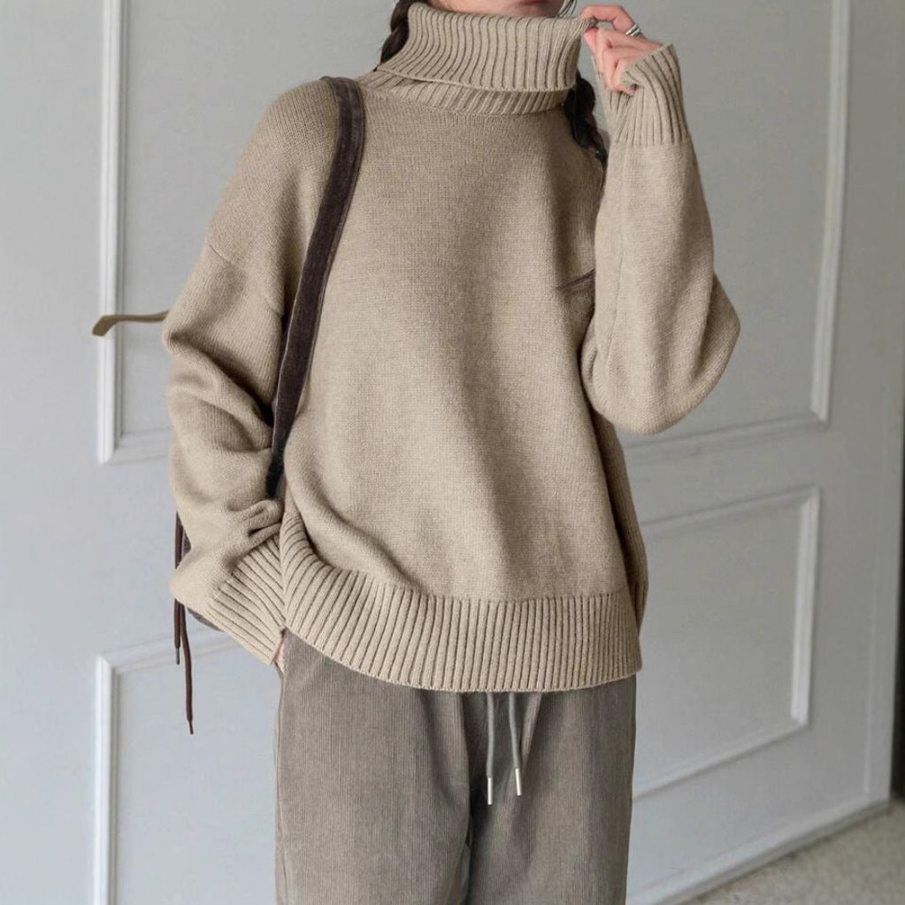 Damen Oversize Rollkragen-Feinstrickpullover mit Raglanärmeln und seitlichen Schlitzen Shop Nory