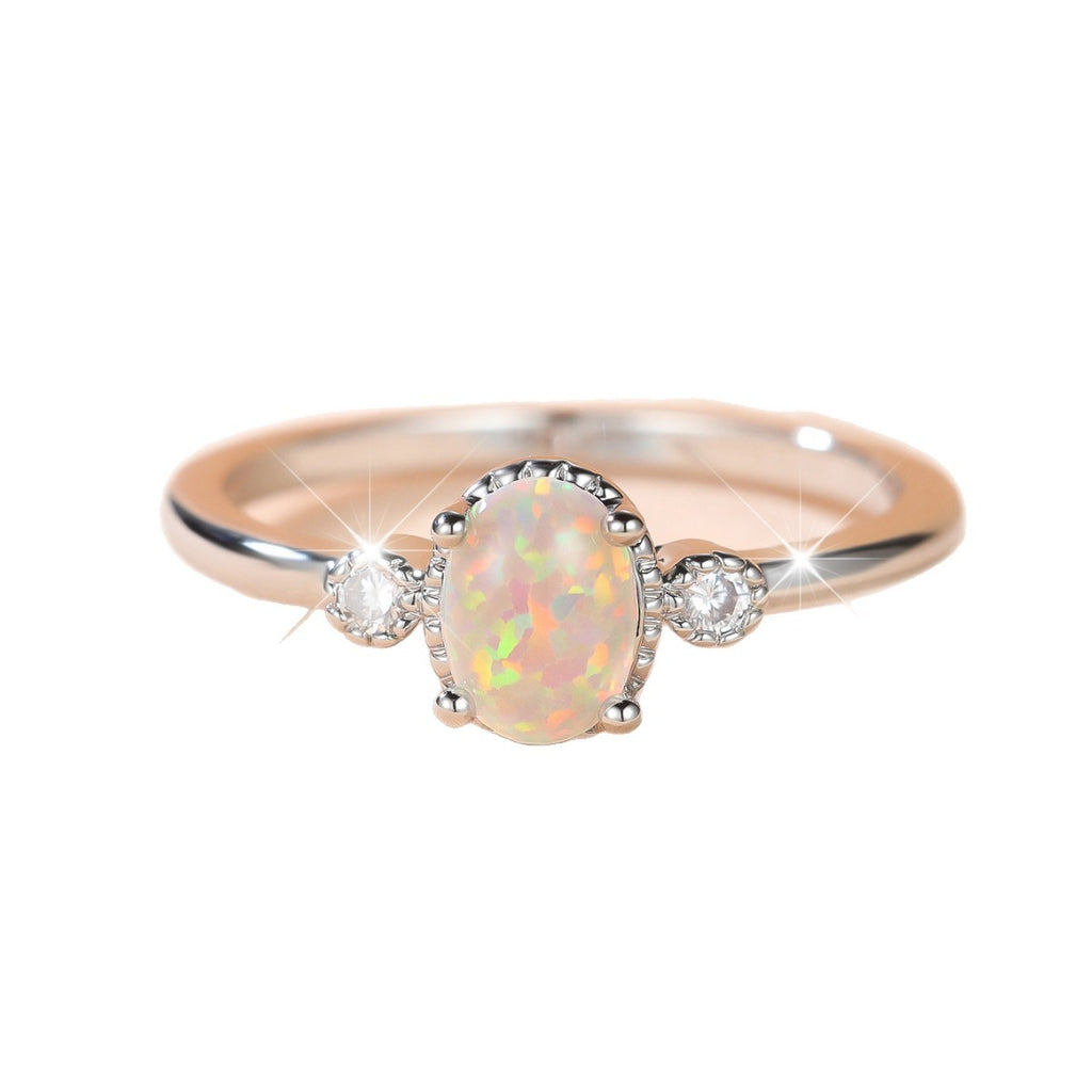 Damen Ring mit schimmerndem Opal und funkelnden Zirkonia Shop Nory