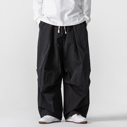 Herren Weite Utility-Loungehose mit überlappenden Falten und Kordelzugbund Shop Nory