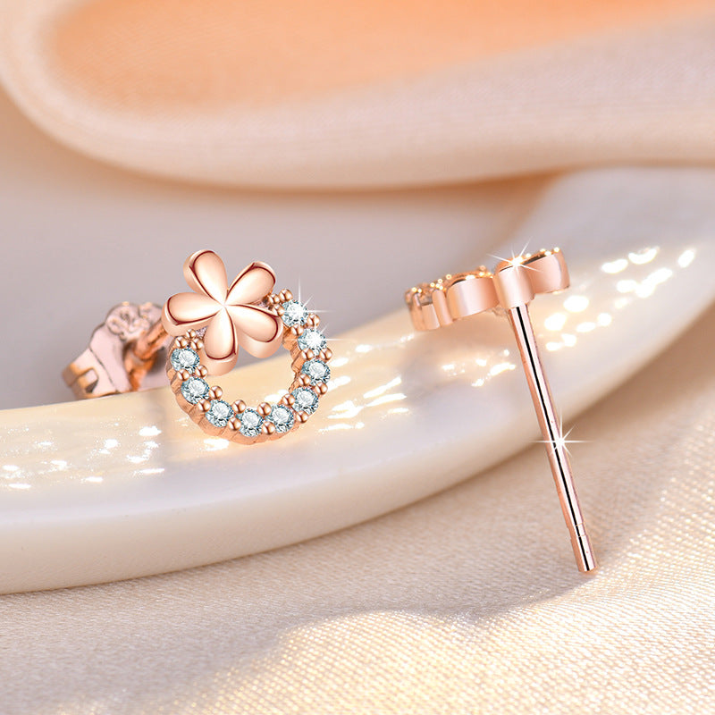 Damen Funkelnde Ohrringe mit floralem Design und Zirkonia-Besatz Shop Nory