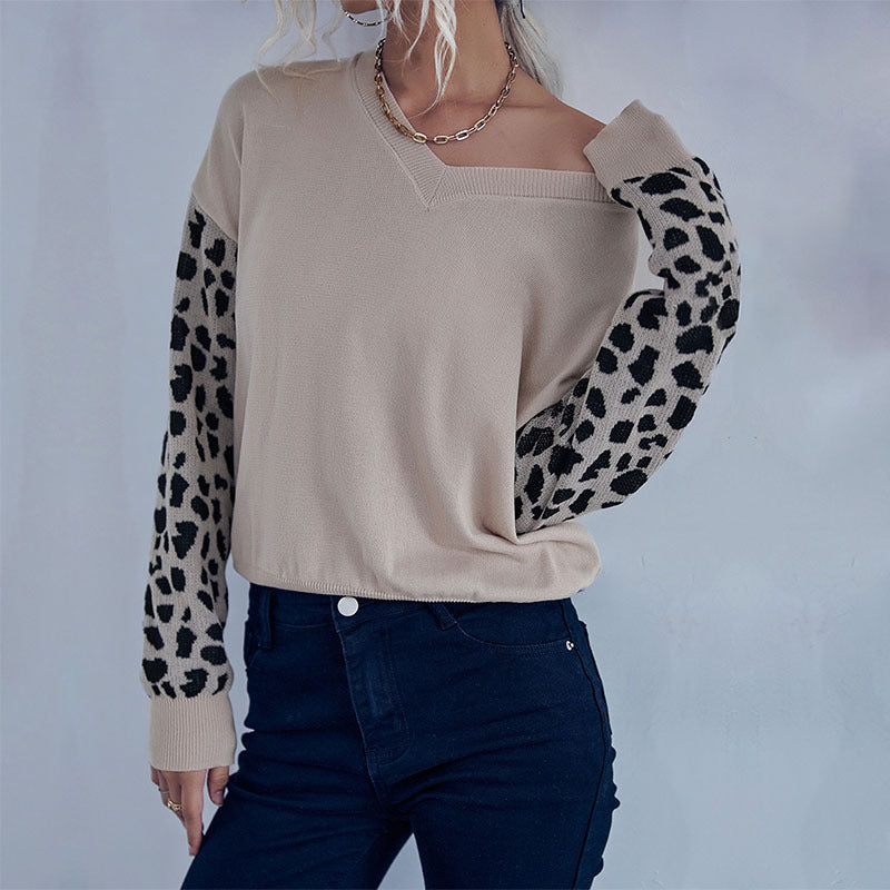 Damen V‑Ausschnitt-Feinstrickpullover mit Animal-Motivärmeln und elastischem Saum Shop Nory